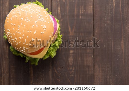 Top view bbq hamburger on the wooden background