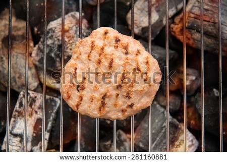 Minced pork on Grill with Dancing Flames Cooked.