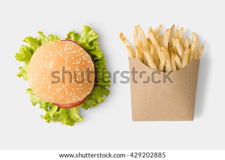 Concept of mock up burger and french fries on white background. Copy space for text and logo. Clipping Path included on white background.