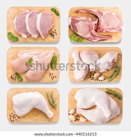 Mockup raw chicken and pork on cutting board set on  isolated on white background. Copy space for text and logo. Clipping Path included isolated on white background.