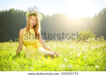 Beautiful girl relaxing outdoors. morning sun