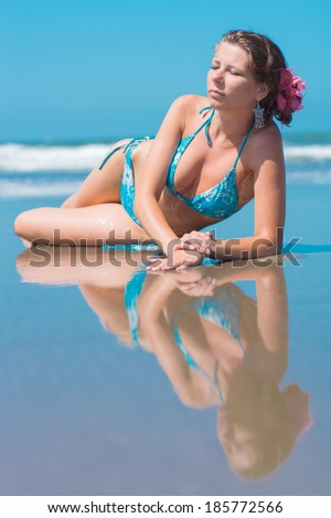 Beautiful russian girl at the beach at a sunny day