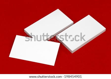 Business card template mockup for branding identity or contact information drawing. Ready to print modern abstract design or hipster logo. Isolated on red paper background.