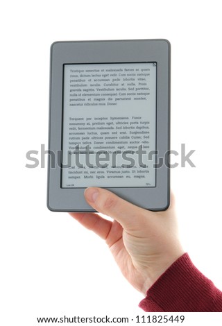 Holding E-book reader in hands,   The reader is deprived of all brand names and buttons, includes a sample text: Lorem Ipsum, which is the text used as an example of a filler in the printing industry.