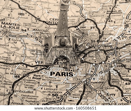 Eiffel Tower on a map of Paris, short focus,  black and white version.