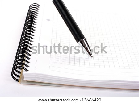 Notepad with pen isolated