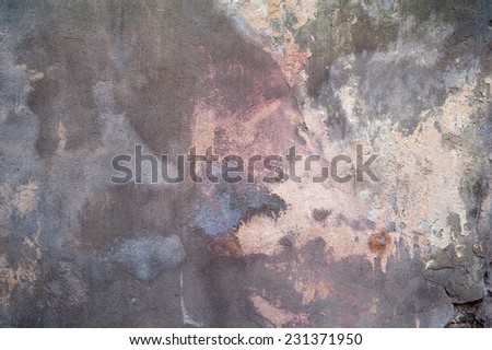 Texture of old rustic wall covered with yellow stucco