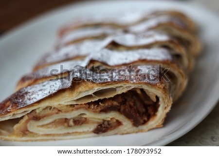 Pieces of Handmade Apple Strudel on a white dish