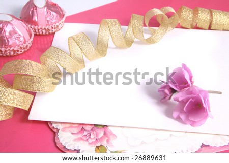 Background with a gold tape and flowers of pink color.