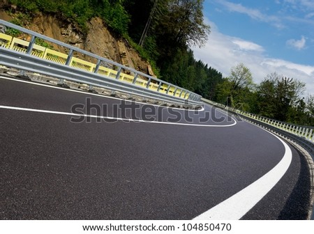 Asphalt twisty mountain road in hills in Slovakia