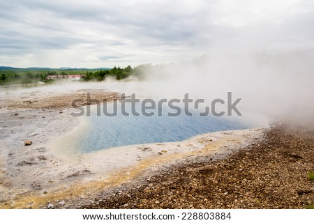 Hot pools of water with steam in Iceland