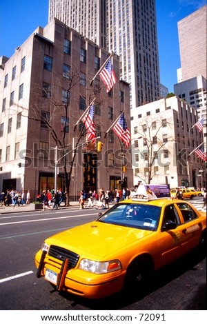 new york cab with US flags in background