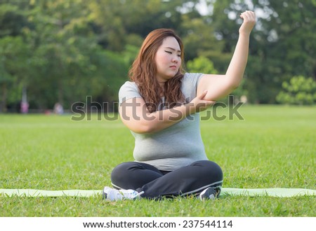 Obese woman is worrying about her overweight
