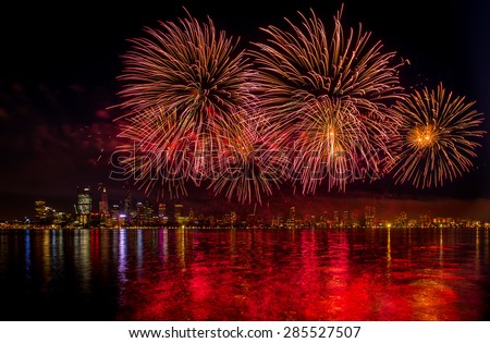 Australia Day, celebration, red fire works over the Swan river, with Perth City in the background