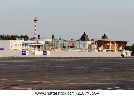 NIZHNY NOVGOROD. RUSSIA. JULY 31, 2014. International airport of Strigino. The air terminal building with passenger terminals. View from the party of an airfield.