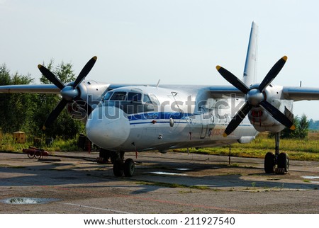NIZHNY NOVGOROD. RUSSIA. JULY 31, 2014. STRIGINO AIRPORT. The Russian AN-26B plane is parked for maintenance