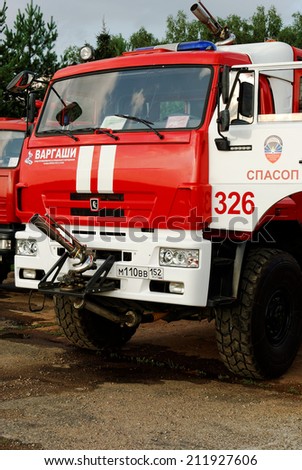 NIZHNY NOVGOROD. RUSSIA. JULY 31, 2014. STRIGINO AIRPORT. Fire truck KAMAZ of Service Search and Abnormally - Saving Ensuring Flights. SPASOP.
