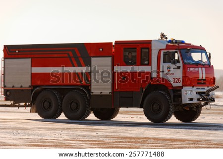 NIZHNY NOVGOROD. RUSSIA. FEBRUARY 17, 2015. The bright red car of fire service of the airport of Strigino in Nizhny Novgorod