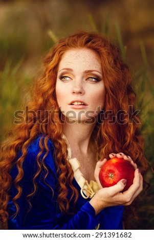 from Brave film. Beautiful red-haired girl in the costume of the heroine of the animated film
