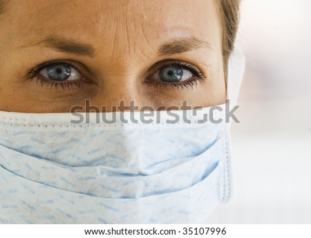 Close up of Female Doctor with Mask on