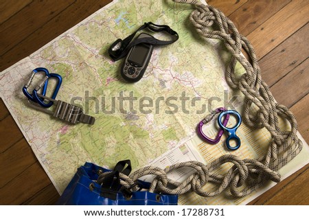 view of adventure gear including map and GPS
