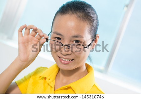 Chinese beautiful girl in yellow looking for inspiration