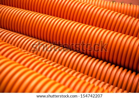orange plastic pipe