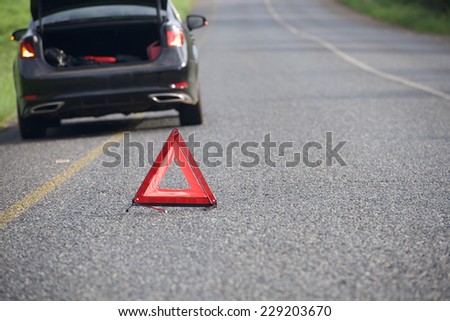 Sign of emergency stop car on the road