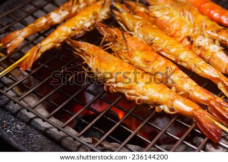 Shrimp fried in the fire in the Asian restaurant