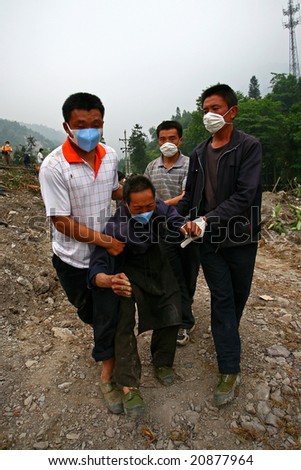 CHINA - MAY 22:  the  Wenchuan Sichuan China  happened Lishi 8.0 magnitude of earthquakes.This picture shows the victim family member was deeply grieved on May 22, 2008