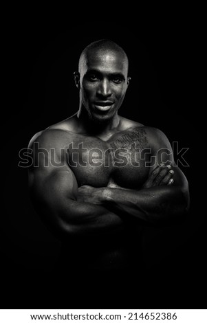 Portraits of a physical fitness trainer, in black and white.