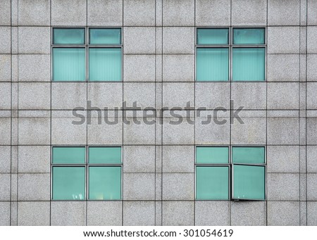 Four green windows on the wall. One window is slightly open.