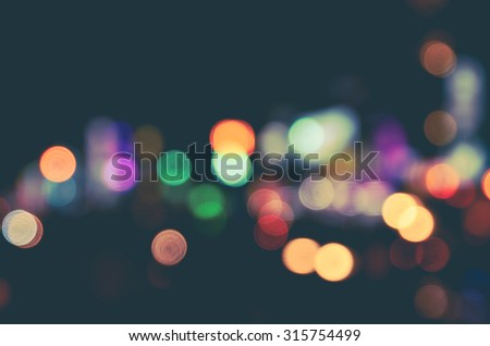 De focused/Blurred image of traffic lights. Blur lights. Light bokeh.