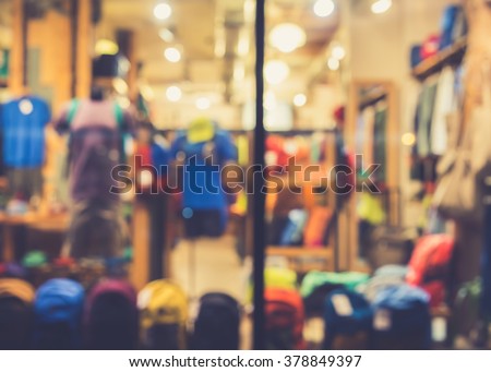 De focused/Blurred image of an outdoor gear and camping gear shop. Vintage effect.