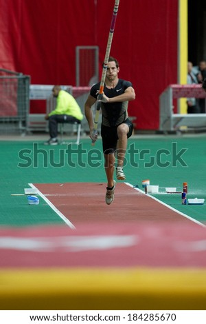 PARIS, FRANCE - JULY 7, 2011 - Renaud Lavillenie goes for a jump at meeting Areva to Stade de France