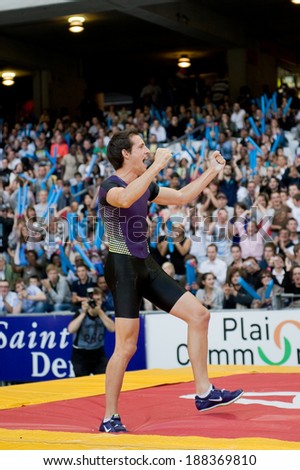 SAINT-DENIS, FRANCE - JULY 16, 2010 -  Renaud Lavillenie goes for a jump at meeting Areva to Stade de France