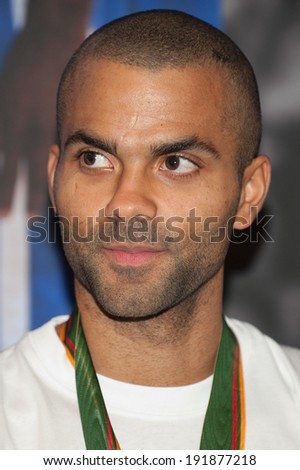 PARIS, FRANCE - SEPTEMBER 19, 2011 - Tony Parker in the Nike store on the Champs Elysees after the silver medal of the French basketball team at the European