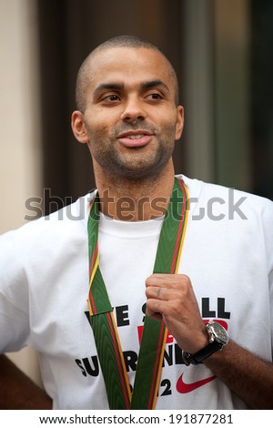 PARIS, FRANCE - SEPTEMBER 19, 2011 - Tony Parker in the Nike store on the Champs Elysees after the silver medal of the French basketball team at the European