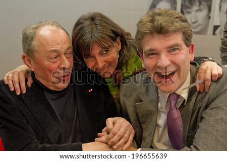 PARIS, FRANCE - MARCH 19, 2011 - Michel Rocard, Anne Hidalgo and Arnaud Montebourg at French Book fair in Paris