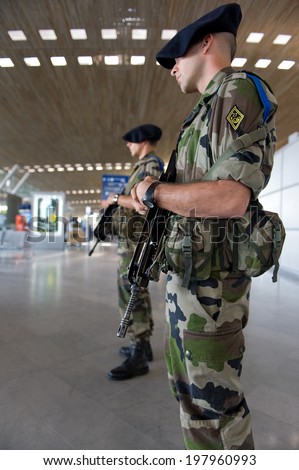 ROISSY CDG, FRANCE - APRIL 18, 2014 - Soldiers on patrol in Roissy for vigipirate Plan against Terrorism