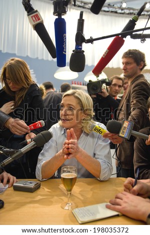 PARIS, FRANCE - FEBRUARY 25, 2011 - Marine le Pen visiting the international agricultural fair 2011 in Paris