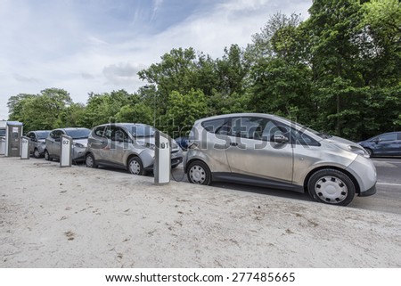 PARIS, FRANCE - MAI 12, 2015: Cars Autolib parked for rental. Autolib is a french carsharing service of electric car.