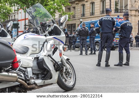 PARIS, FRANCE - MAY 21, 2015 : French police cars blocking a street in Paris