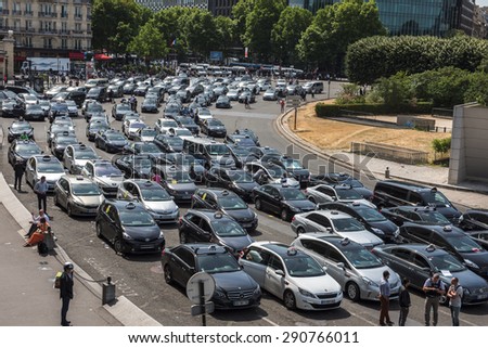 PARIS, FRANCE - JUNE  25, 2015 : Taxi block Porte Maillot to protest against the service Ubber Pop.