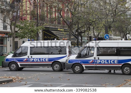 PARIS, FRANCE - NOVEMBER 14, 2015 : Police in front of the theater Bataclan to protect crime scene after terrorist attack of ISIS at Paris november 13, 2015.