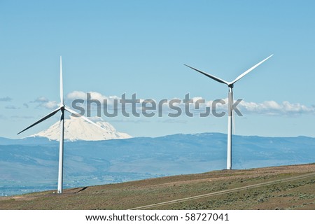 Giant wind turbines on a mountain ridge