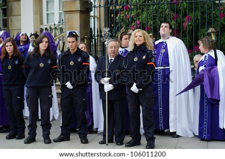 PONTEVEDRA - APRIL 5: Members of Civil Protection in the Catholic processions held on the occasion of Easter April 5, 2012 in Pontevedra, Galicia, Spain.