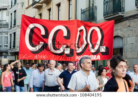 PONTEVEDRA - JULY 19: Detail of one of the banners of one of the unions involved in the protest at the cuts to staff members, by the current government in Spain, on July 19, 2012 in Pontevedra, Spain.