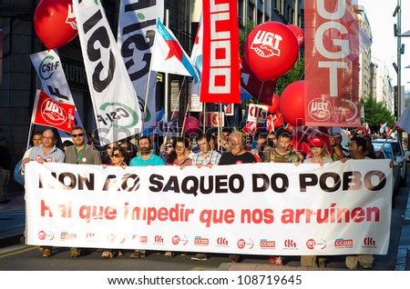 PONTEVEDRA - JULY 19: Head of the manifestation of all unions and associations to protest the social cuts, of the Conservative government, July 19, 2012 in Pontevedra, Spain.