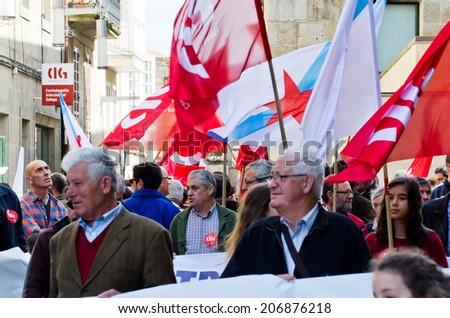 PONTEVEDRA, SPAIN - MAY 1, 2014: Detail of the participants, including major labor unions, in the demonstration for the celebration of Labor Day.